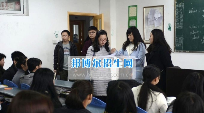 武侯区教育局资助中心去成都机电工程学校检查指导工作