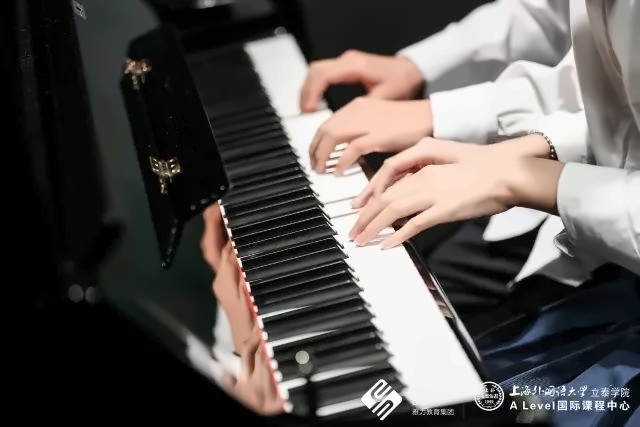 四手联弹《拉德斯基进行曲》.jpg